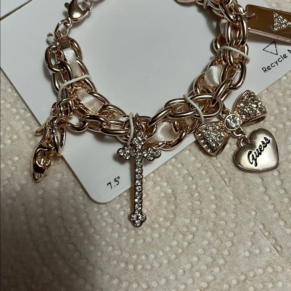 Guess Gold-Tone Charm Bracelet with Sparkling Accents - Picture 2 of 4